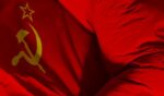 The Flag of the Soviet Union waves.