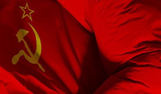 The Flag of the Soviet Union waves.