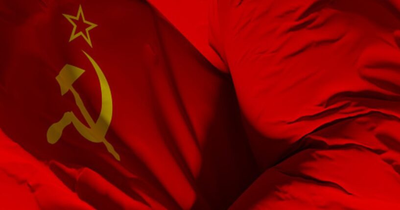 The Flag of the Soviet Union waves.