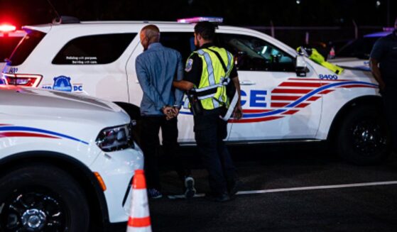 Individual gets arrested by Metropolitan Police in Washington, D.C. on August 28, 2025.