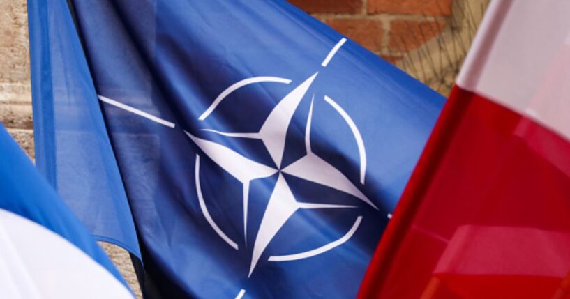 The NATO flag flies amongst others on February 20, 2026.