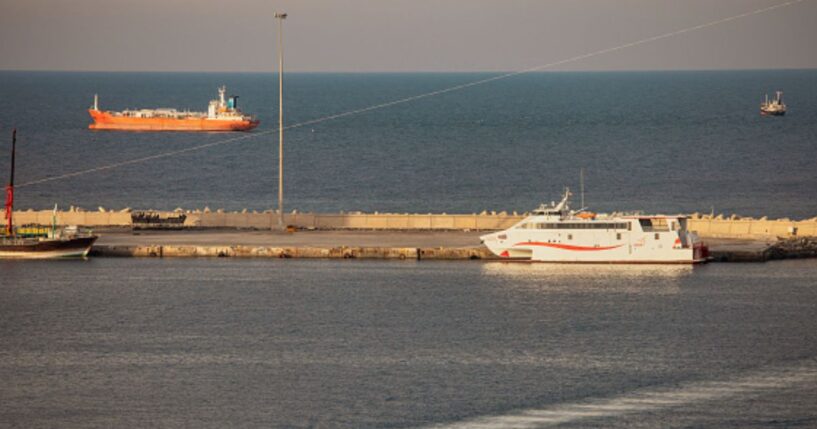 Ships cross the waters near the Strait of Hormuz in Muscat, Oman on March 30, 2026.