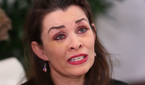 Epstein survivor Alicia Arden sits in press conference with her attorney, Gloria Allred, on August 6, 2025.