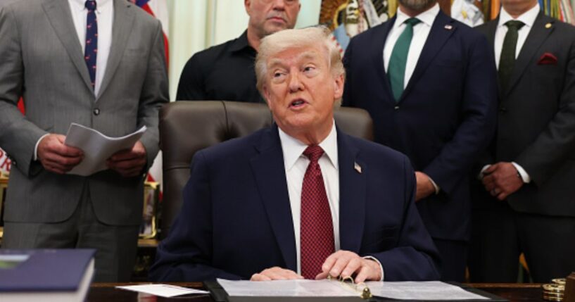 President Trump sits in the Oval Office alongside advisors and administration officials on April 18, 2026.