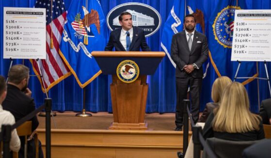 Acting Attorney General Todd Blanche stands and announces initiative against the SPLC alongside FBI Director Kash Patel on April 21, 2026.