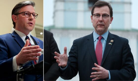 House Speaker Mike Johnson, left, said GOP Rep.Thomas Kean Jr., pictured at right in during a 2024 trip to Kyiv, Ukraine, has been absent because he's dealing with a health issue.