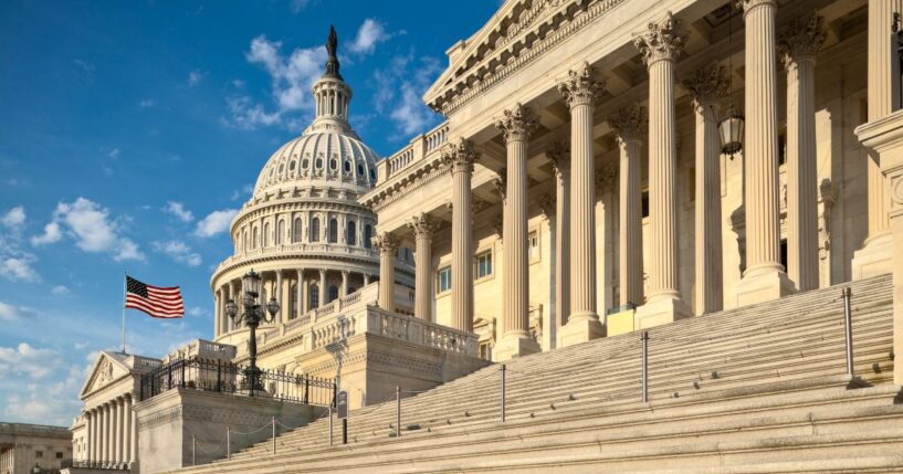 A view of the east facade of the US Capitol basking in the early morning sun.