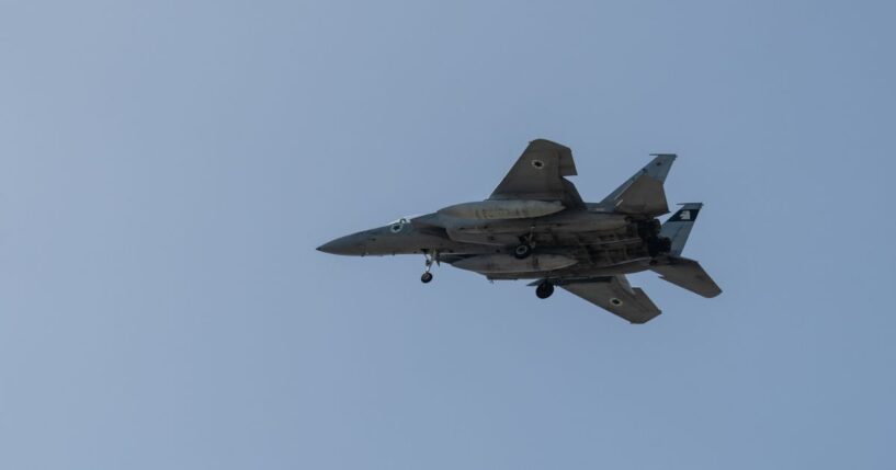 An F-15 fighter jet flies on March 20, 2026 in Rehovot, Israel.