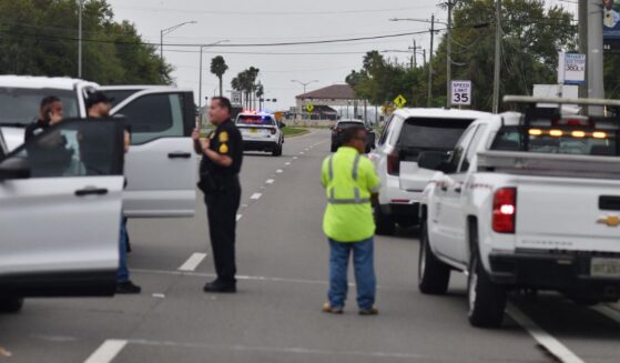 Law enforcement officers block traffic outside MacDill Air Force Base, the home of CENTCOM headquarters, in Tampa, Florida, on March 16, 2026.