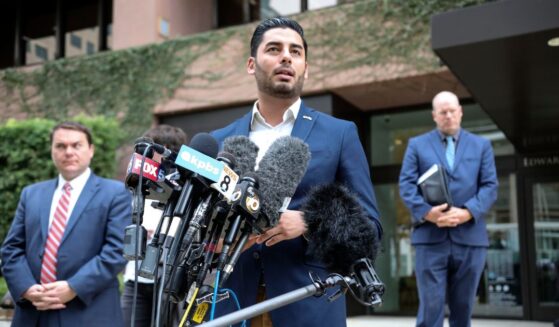 Ammar Campa-Najjar, a Democrat candidate who was running for congress in Rep. Duncan Hunter's district, speaks to reporters outside the Federal Courthouse in San Diego, California, on Dec. 3, 2019.