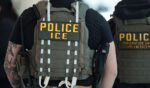 Immigration and Customs Enforcement agents walk through Terminal C at LaGuardia Airport in New York on March 24, 2026.