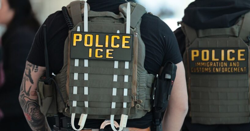 Immigration and Customs Enforcement agents walk through Terminal C at LaGuardia Airport in New York on March 24, 2026.