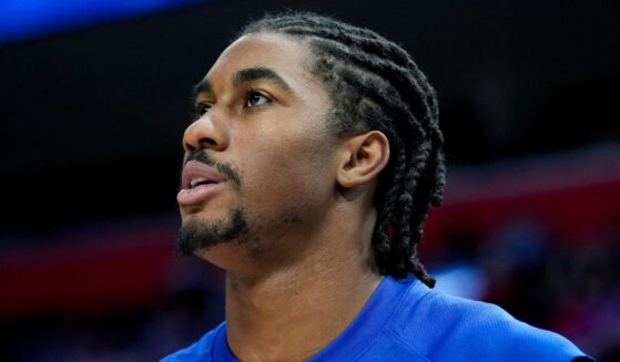 Jaden Ivey, playing for the Detroit Pistons, looks on at Little Caesars Arena in Detroit, Michigan, prior to a match against the Milwaukee Bucks on Dec. 6, 2025.