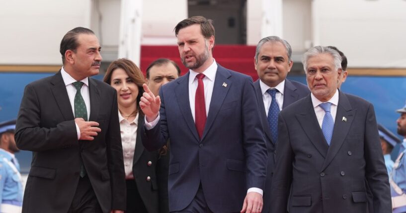 Vice President JD Vance walks alongside Pakistan Chief of Defence Forces and Chief of Army Staff Field Marshall Asim Munir, and Pakistani Deputy Prime Minister and Foreign Minister Mohammad Ishaq Dar just prior to negotiations with Iranian officials on April 11, 2026 in Islamabad, Pakistan.