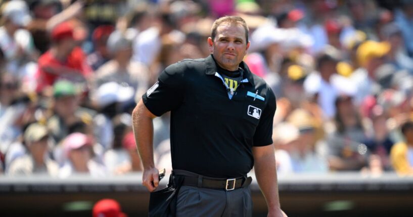 MLB umpire Brock Ballou looks on at a game between the San Diego Padres and the St. Louis Cardinals at Petco Park on Aug. 3, 2025.