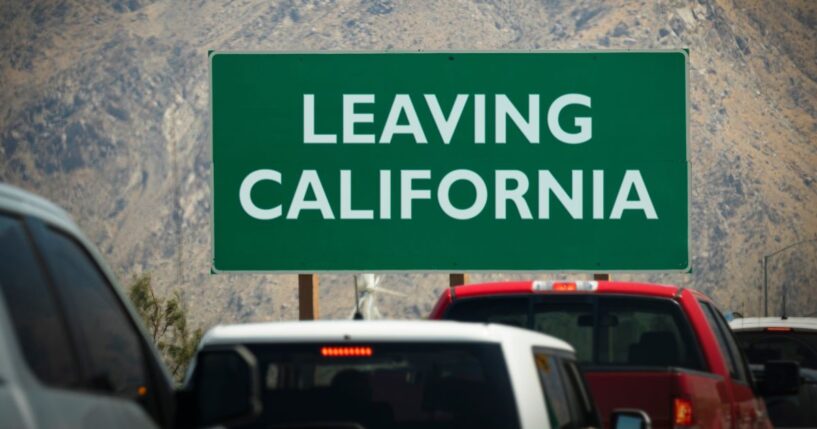 A leaving California sign at the border of the Golden State.