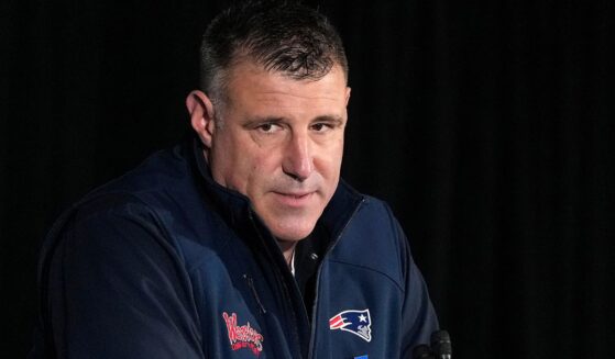 Head coach Mike Vrabel of the New England Patriots will reportedly miss part of the NFL draft Saturday.