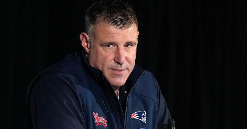 Head coach Mike Vrabel of the New England Patriots will reportedly miss part of the NFL draft Saturday.