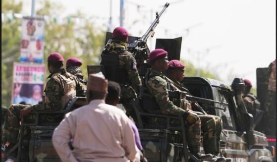 Soldiers patrol the streets in northern Nigeria in a file photo from Feb. 13. More thanr 25 people were killed over Easter weekend during several attacks in Nigeria.