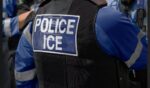 An Immigration and Customs Enforcement officer is seen in a stock photo. The FBI is participating in the investigation of a shooting Tuesday by ICE agents who said a California gang member attempted to run down an officer.