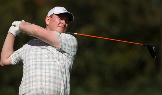 Robert MacIntyre of Scotland plays his shot Thursday from the 11th tee during the first round of the 2026 Masters Tournament at Augusta National Golf Club in Augusta, Georgia.