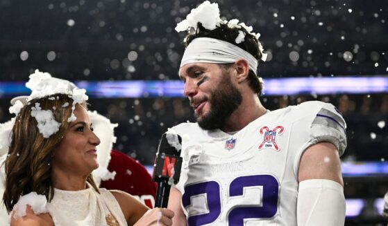 Diana Russini, left, interviews Harrison Smith #22 of the Minnesota Vikings on Netflix after the game against the Detroit Lions on Dec. 25 in Minneapolis, Minnesota.
