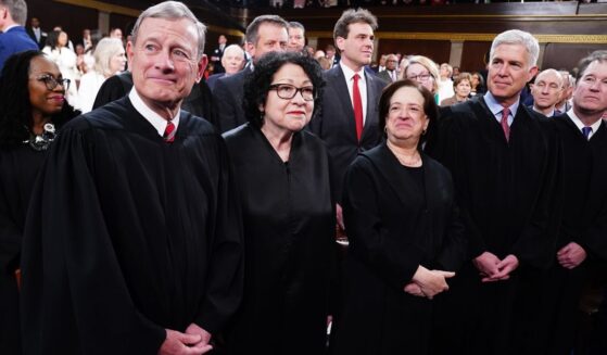 Supreme Court Chief Justice John Roberts, left, and Associate Justices Sonia Sotomayor, Elena Kagan, Neil Gorsuch, and Brett Kavanaugh stand on the House floor ahead of the annual State of the Union address by then- President Joe Biden before a joint session of Congress on March 7, 2024.