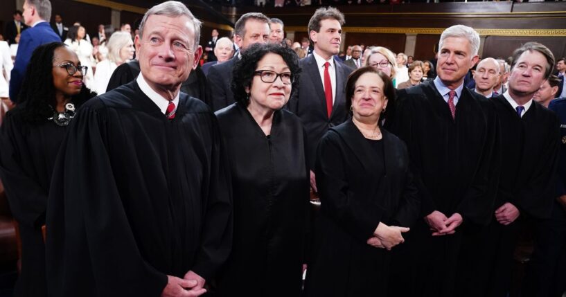 Supreme Court Chief Justice John Roberts, left, and Associate Justices Sonia Sotomayor, Elena Kagan, Neil Gorsuch, and Brett Kavanaugh stand on the House floor ahead of the annual State of the Union address by then- President Joe Biden before a joint session of Congress on March 7, 2024.