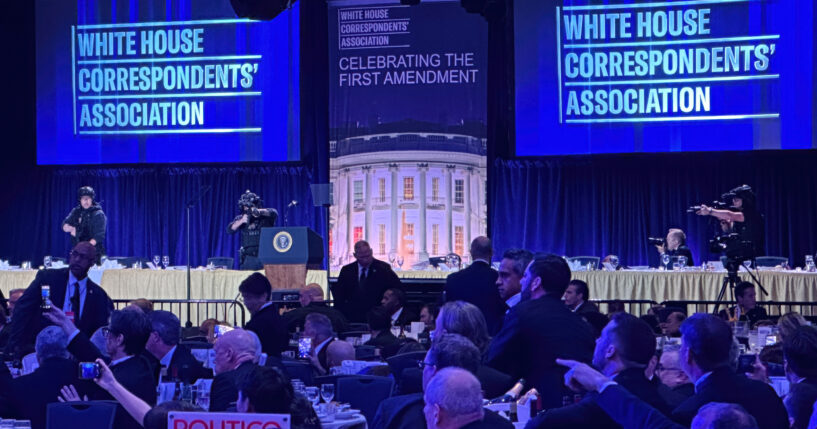 Members of the U.S. Secret Service counter assault team cover the stage of the White House Correspondents' dinner after a shooting took place in Washington, DC on April 25, 2026.