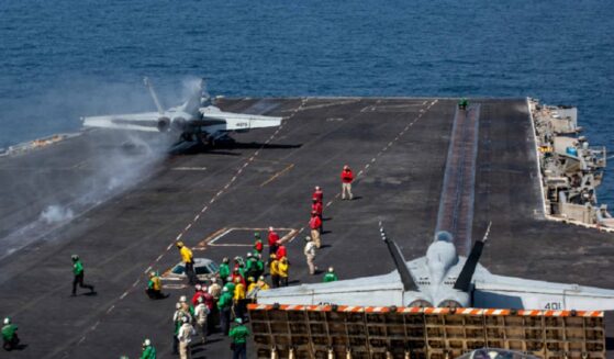 An F/A-18E Super Hornet prepares to launch from the flight deck of the USS Abraham Lincoln at the beginning of Operation Epic Fury, the attack on Iran, on Feb 28.