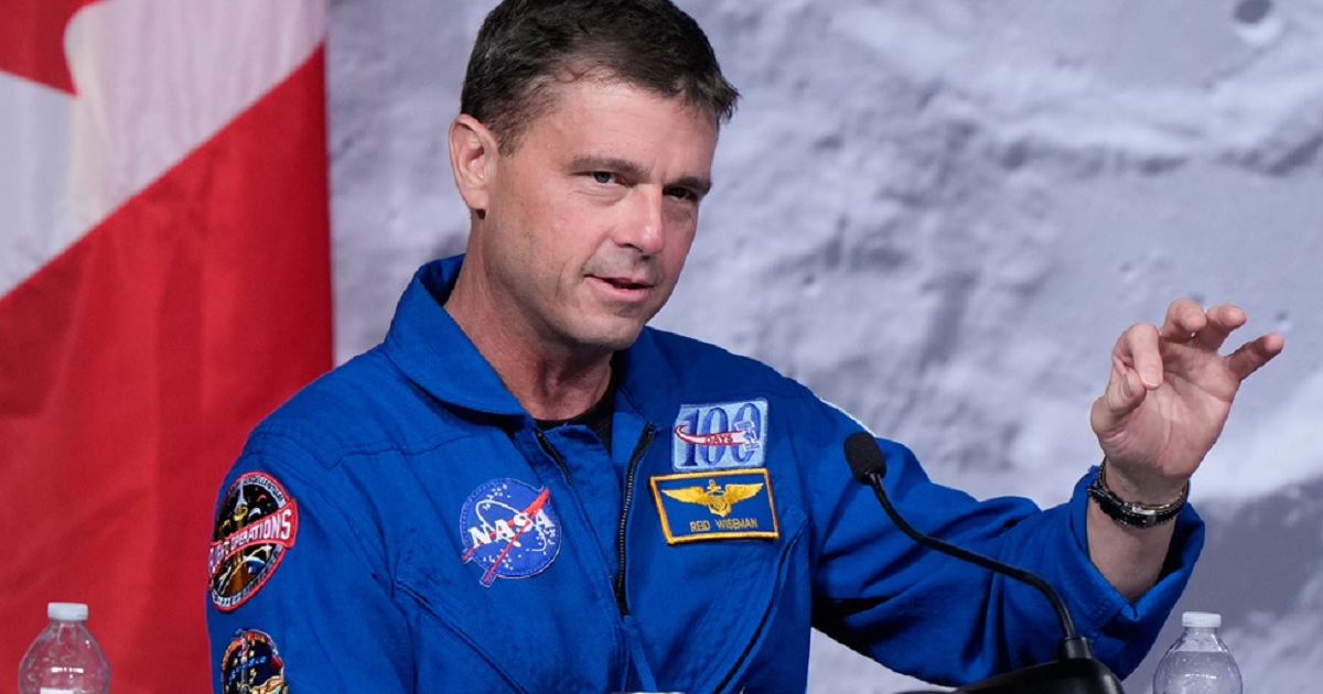 Artemis II commander and Navy Capt. Reid Wiseman talks to reporters Thursday at the Johnson Space Center in Houston.