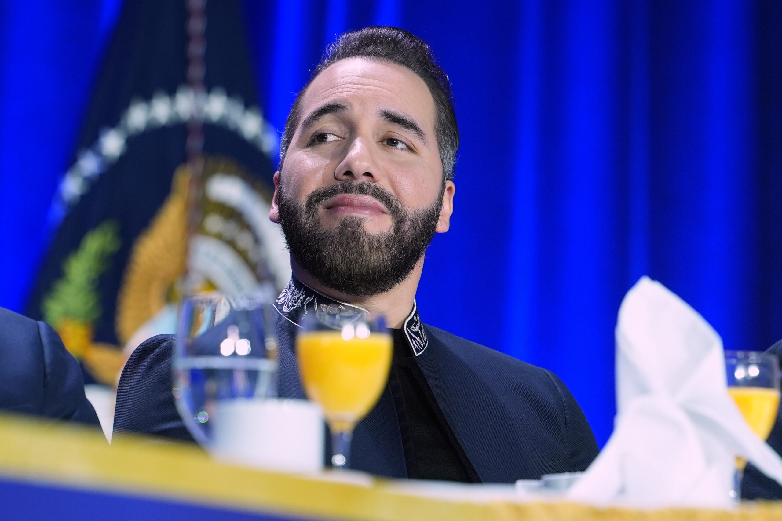 President of El Salvador, Nayib Armando Bukele Ortez, listens as President Donald Trump speaks during the National Prayer Breakfast on Feb. 5, 2026, in Washington, D.C.