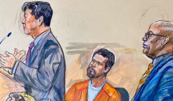 A courtroom sketch of defendant Cole Tomas Allen entering a plea on Monday.