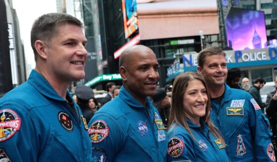 The Artemis II astronauts, mission specialist Jeremy Hansen of the Canadian Space Agency, pilot Victor Glover, mission specialist Christina Koch, and commander Reid Wiseman pose for photos outside of the Nasdaq Marketside on April 30 in New York City.