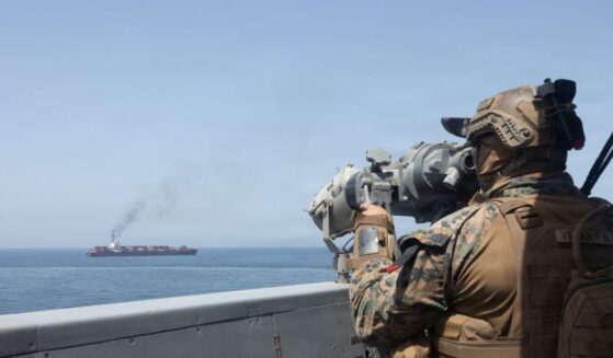 In this handout photo provided by U.S. Central Command, U.S. forces patrol the Arabian Sea near M/V Touska on April 20, 2026, after firing upon the Iranian-flagged vessel that the U.S. accused of attempting to violate the U.S. naval blockade of Iranian ports near the Strait of Hormuz.