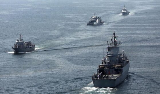 This handout photo made available by the Iranian Army Office on March 12, 2025, shows navy vessels taking part in a joint Iranian-Russian-Chinese military drill in the Gulf of Oman.