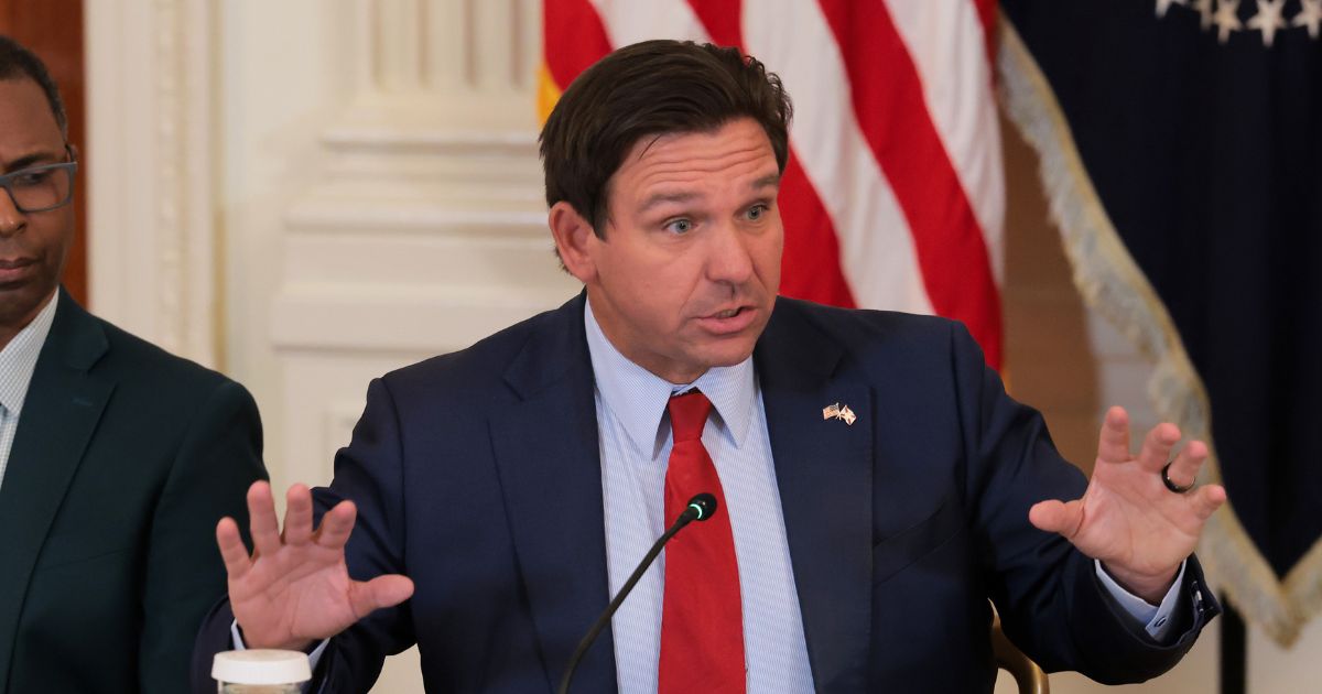Florida Gov. Ron DeSantis speaks during a roundtable discussion on college sports in the East Room of the White House on March 6, 2026, in Washington, D.C.
