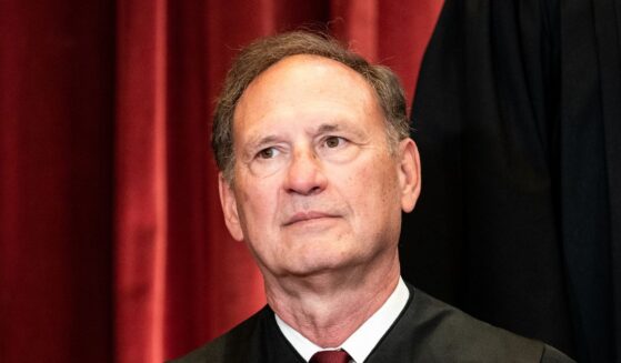 Supreme Court Justice Samuel Alito sits during a group photo of the Justices at the Supreme Court in Washington, D.C., on April 23, 2021.