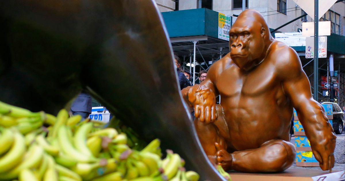 A Harambe statue is seen Oct. 18, 2021, in front of the Charging Bull statue on New York City's Wall Street.