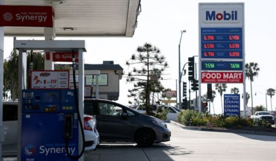 Vehicles park at a Mobil gas station in Redondo Beach, California on April 30, 2026.