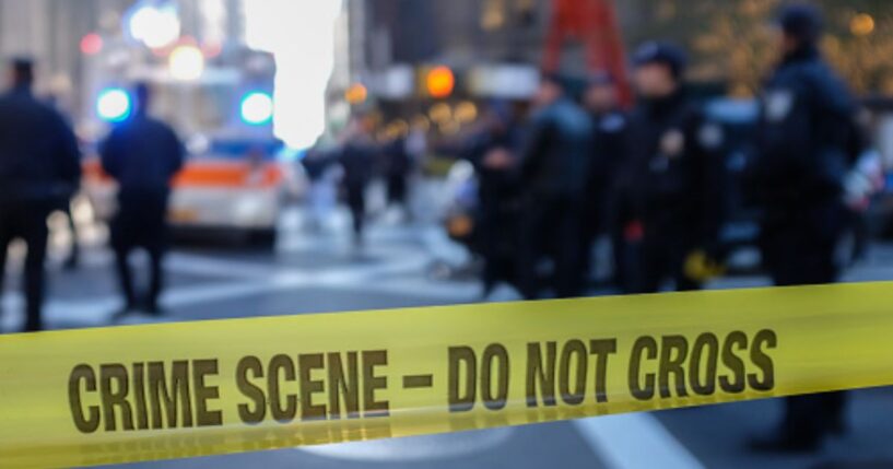 A crime scene with police tape.