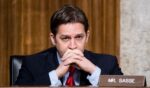 Former Senator Bill Sasse sits in the Senate Armed Services Committee room on January 12, 2017.