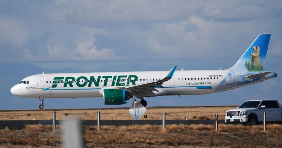 A Frontier plane can be seen as it taxis down the runway preparing for takeoff on November 25, 2025.