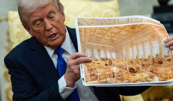 President Trump displays artists’ renderings of the new East Wing ballroom on October 22, 2025.