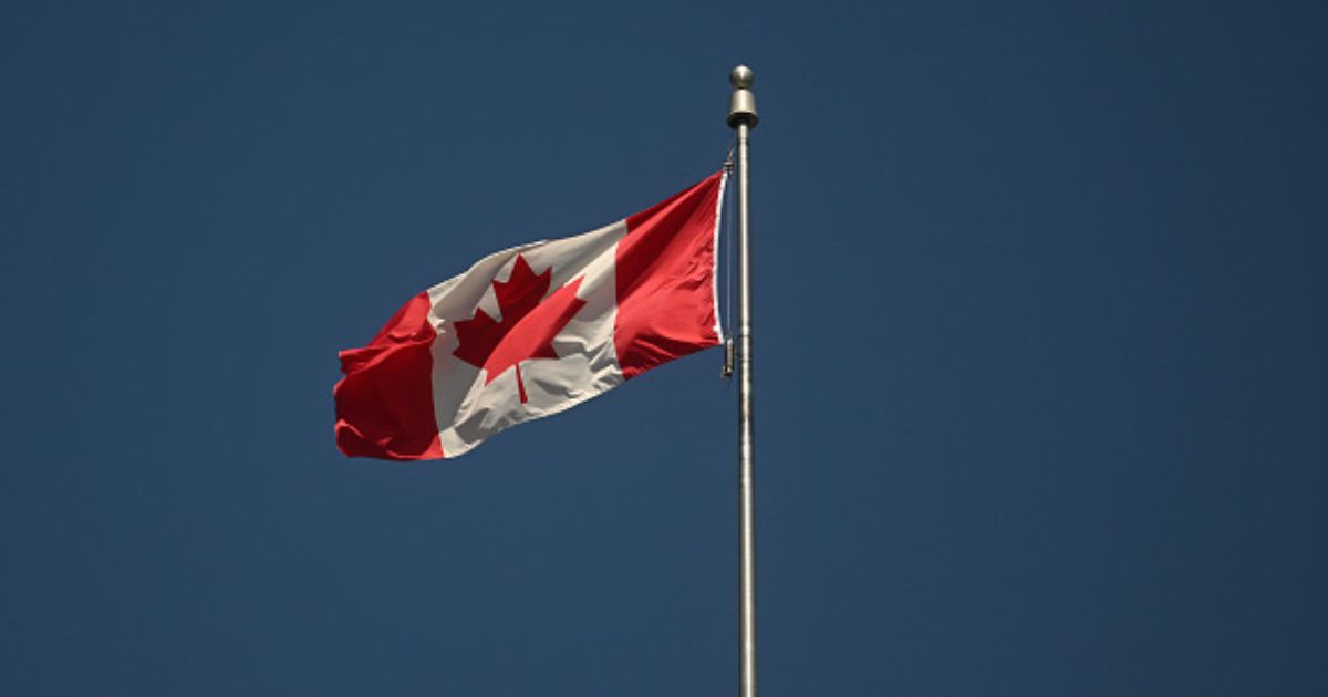 The Canadian flag flies in Montreal, Quebec, Canada.