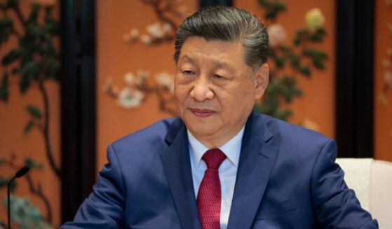 President Xi Jinping of China sits in a meeting room as he looks to the press during President Trump’s state visit to China on May 15, 2026.