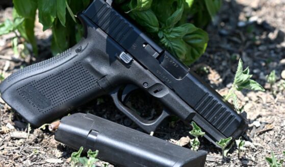 A gun is photographed as it lays on the ground in Richmond, Virginia on July 7, 2021.