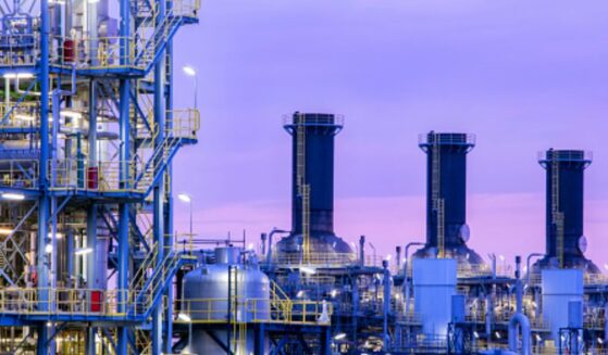 A chemical plant operates as dusk falls.