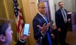 Senate Majority Leader John Thune, a South Dakota Republican, gestures pauses to speak to reporters Thursday as he walks into his office at the U.S. Capitol Building in Washington, D.C.