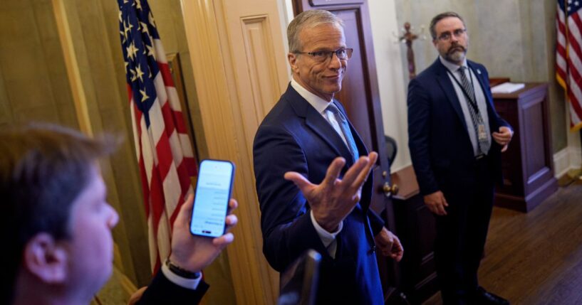 Senate Majority Leader John Thune, a South Dakota Republican, gestures pauses to speak to reporters Thursday as he walks into his office at the U.S. Capitol Building in Washington, D.C.